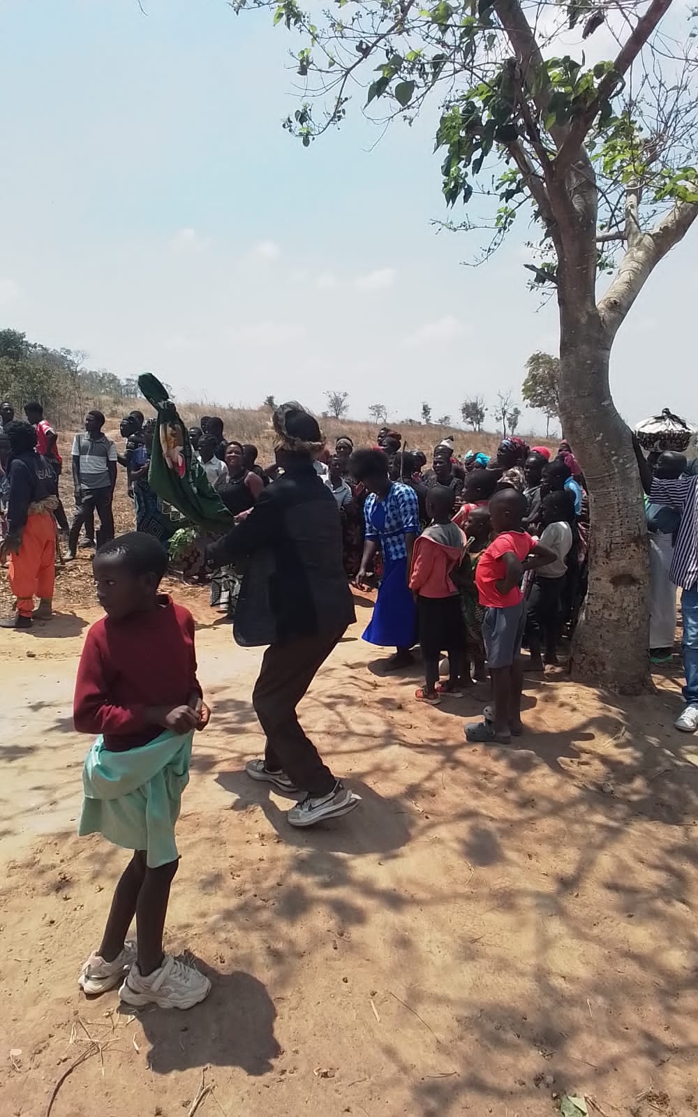 Community gathering in Katosa Village