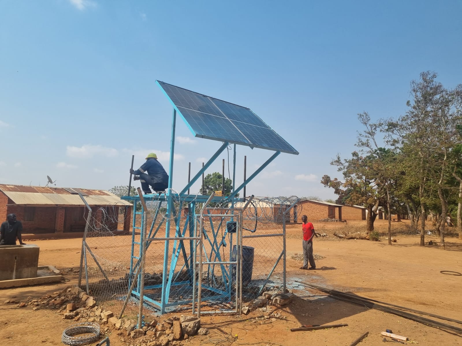 Solar equipment being installed in the village
