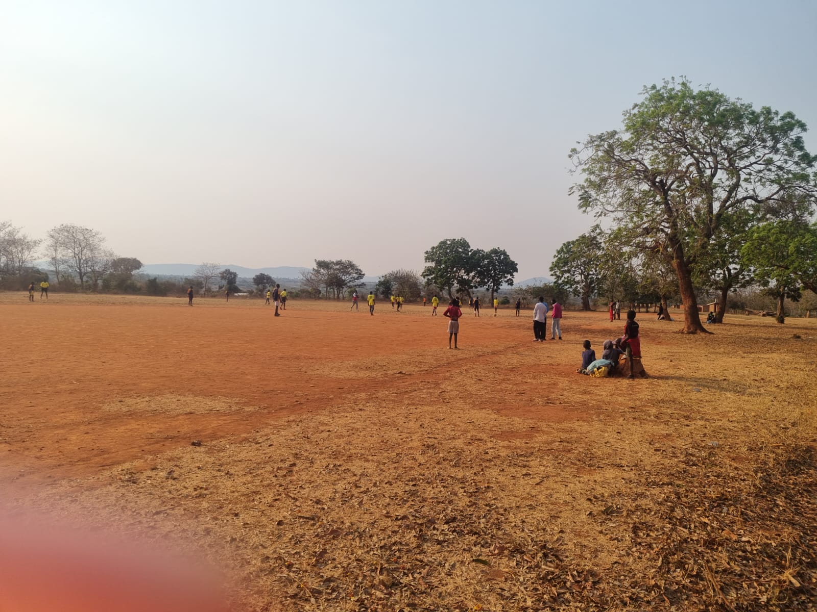 Sponsored football activity on the Katosa community playing field